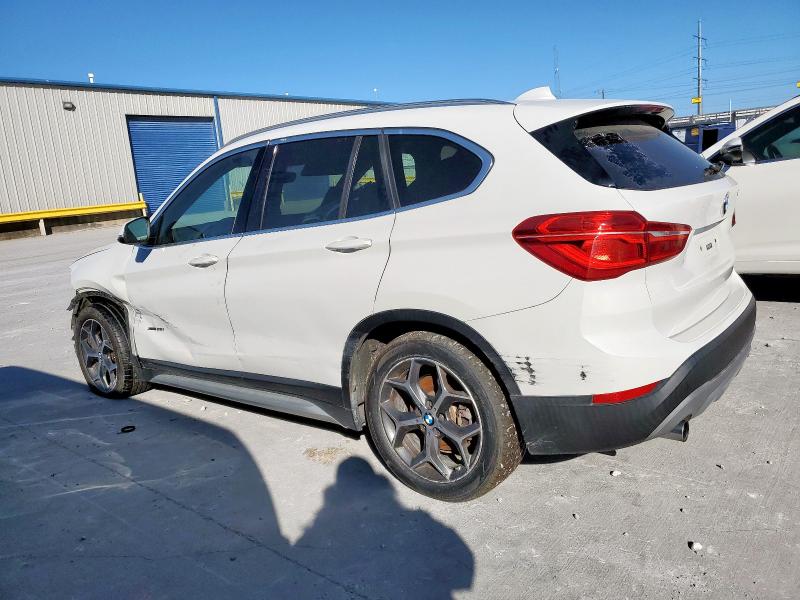 Photo 2 from auction – 2017 BMW X1 XDRIVE2 with VIN WBXHT3Z36H4A52056