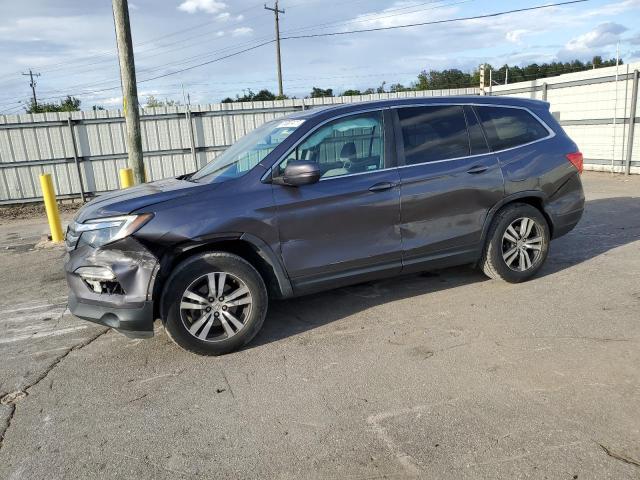 HONDA PILOT EXL 2018 with VIN 5FNYF5H57JB021865 - Photo from auction