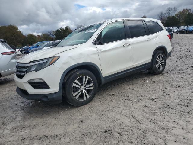 HONDA PILOT 2017 with VIN 5FNYF5H59HB036278 - Photo from auction