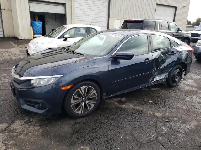 HONDA CIVIC EX 2017 with VIN 19XFC1F32HE200583 - Photo from auction