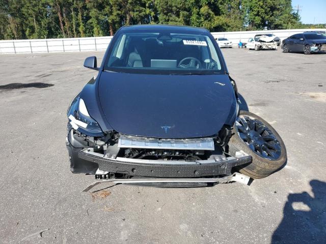 Photo 5 from auction – 2023 TESLA MODEL Y with VIN 7SAYGDEE3PA197297