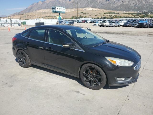 Photo 4 from auction – 2015 FORD FOCUS with VIN 1FADP3J24FL281084