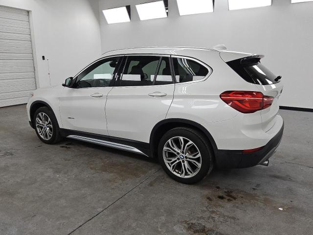 Photo 2 from auction – 2017 BMW X1 XDRIVE2 with VIN WBXHT3C35H5F83283