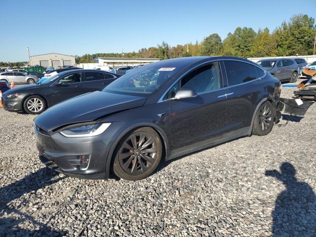 TESLA MODEL X 2017 with VIN 5YJXCBE2XHF056830 - Photo from auction