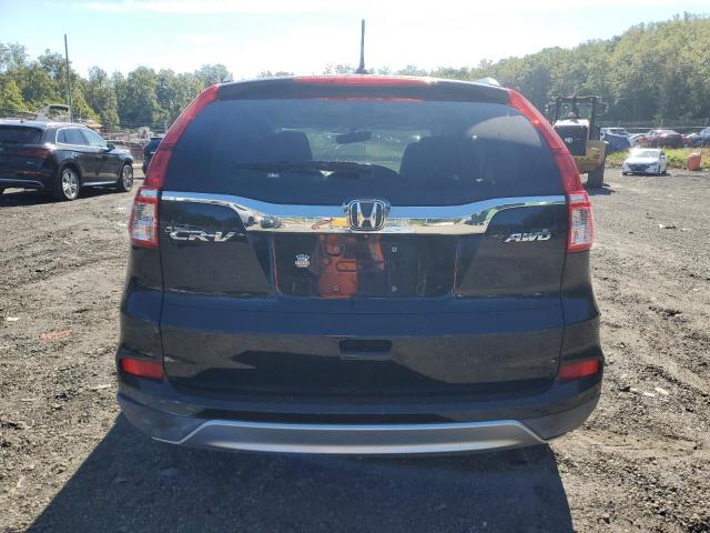 Photo 6 from auction – 2015 HONDA CR-V with VIN 2HKRM4H73FH620678