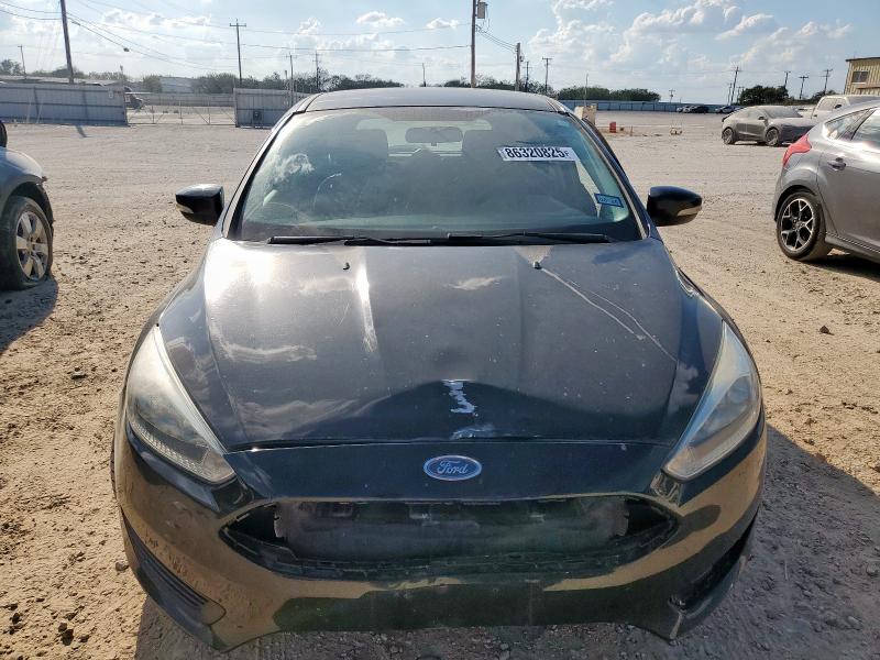 Photo 5 from auction – 2015 FORD FOCUS SE with VIN 1FADP3K23FL282564