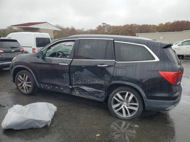 Photo 2 from auction – 2016 HONDA PILOT TOUR with VIN 5FNYF6H96GB128147