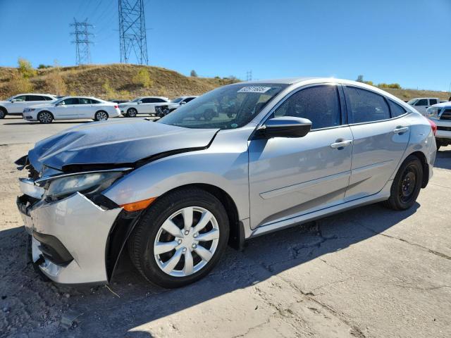 HONDA CIVIC 2018 with VIN 19XFC2F54JE200646 - Photo from auction