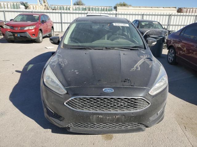 Photo 5 from auction – 2015 FORD FOCUS SE with VIN 1FADP3K29FL380207