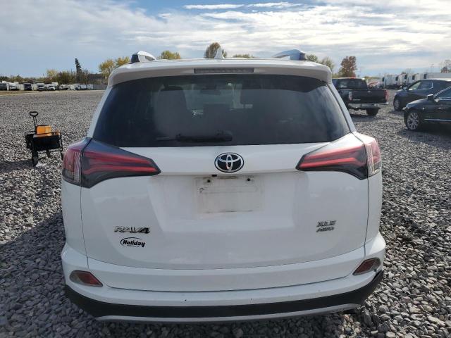 Photo 6 from auction – 2018 TOYOTA RAV4 ADVEN with VIN JTMRFREV4JD255114