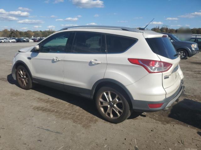 Photo 2 from auction – 2016 FORD ESCAPE TIT with VIN 1FMCU9J98GUA05013