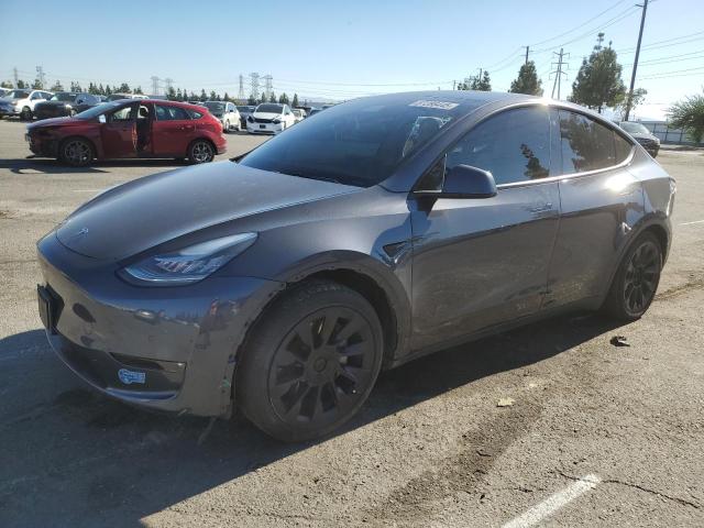 TESLA MODEL Y 2021 with VIN 5YJYGDEE0MF274414 - Photo from auction