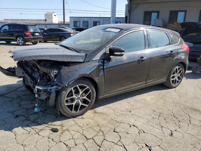 FORD FOCUS SEL 2018 with VIN 1FADP3M28JL205212 - Photo from auction