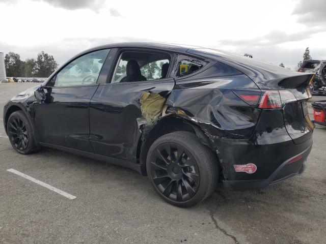 Photo 2 from auction – 2023 TESLA MODEL Y with VIN 7SAYGDEE8PF809061