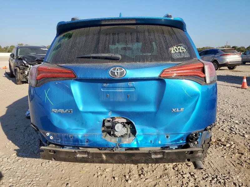 Photo 6 from auction – 2016 TOYOTA RAV4 XLE with VIN 2T3WFREV6GW251659