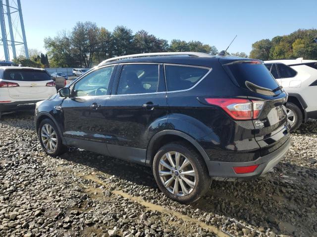 Photo 2 from auction – 2018 FORD ESCAPE TIT with VIN 1FMCU9J94JUC44100