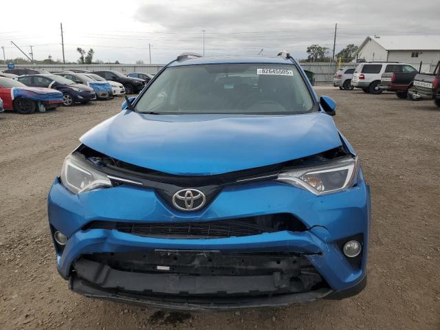 Photo 5 from auction – 2016 TOYOTA RAV4 XLE with VIN 2T3RFREV4GW444129