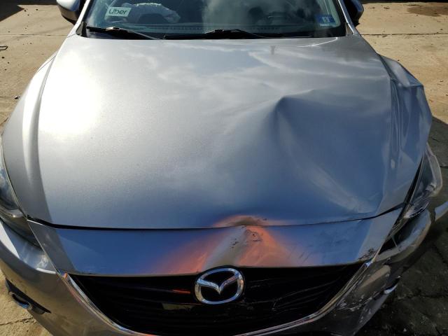 Photo 11 from auction – 2014 MAZDA 3 with VIN JM1BM1L33E1107487