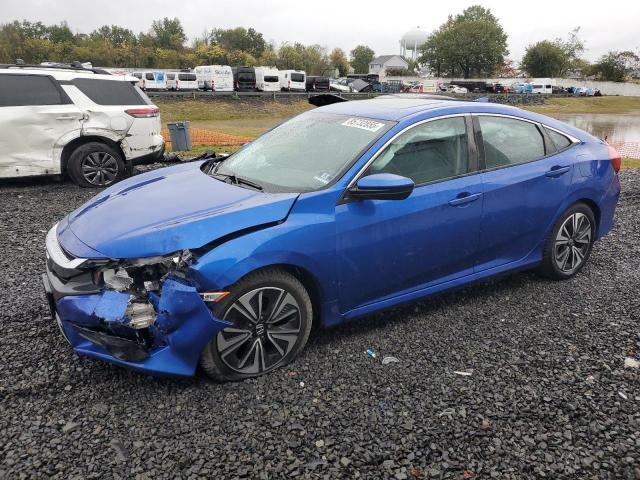HONDA CIVIC EXL 2017 with VIN 2HGFC1F70HH643114 - Photo from auction
