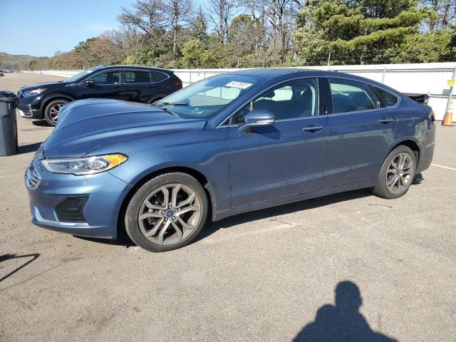 FORD FUSION SEL 2019 with VIN 3FA6P0CD4KR271334 - Photo from auction