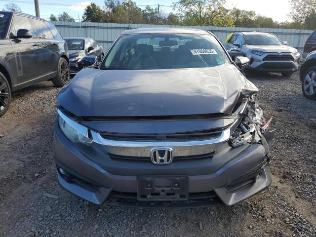 Foto 5 de la subasta – 2016 HONDA CIVIC con VIN 2HGFC1F34GH643452