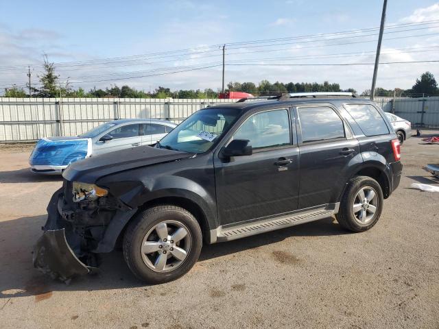 FORD ESCAPE LIM 2011 with VIN 1FMCU0EG7BKB51086 - Photo from auction