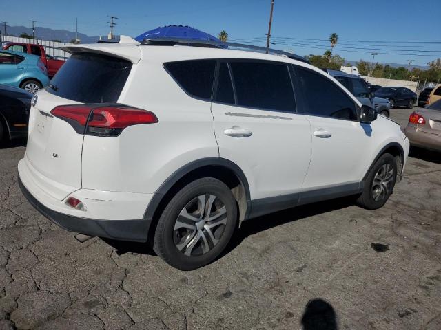 Photo 3 from auction – 2017 TOYOTA RAV4 LE with VIN 2T3ZFREV5HW372634