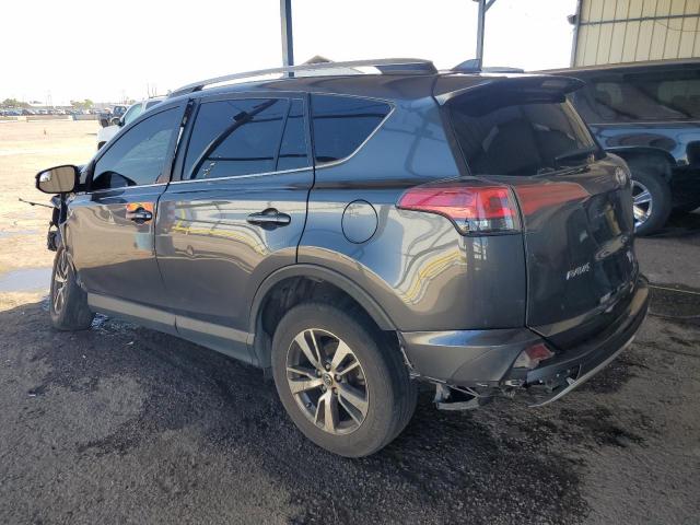Photo 2 from auction – 2017 TOYOTA RAV4 XLE with VIN JTMWFREV6HD099283