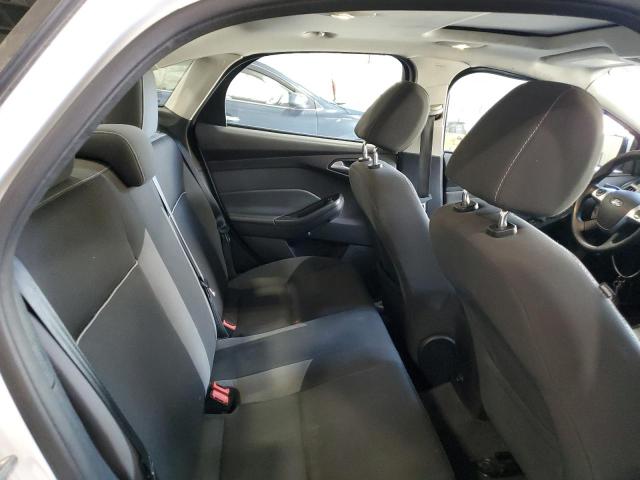 Photo 10 from auction – 2014 FORD FOCUS SE with VIN 1FADP3F27EL306406