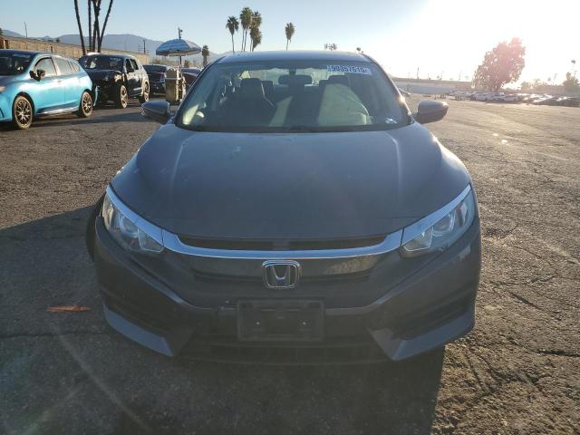 Photo 5 from auction – 2018 HONDA CIVIC EX with VIN 2HGFC2F76JH560010