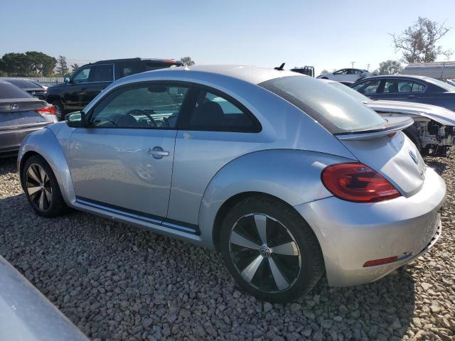 Photo 2 from auction – 2013 VOLKSWAGEN BEETLE TUR with VIN 3VWVA7AT2DM656043