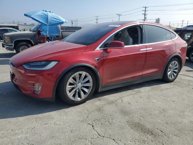 TESLA MODEL X 2017 with VIN 5YJXCDE21HF068943 - Photo from auction