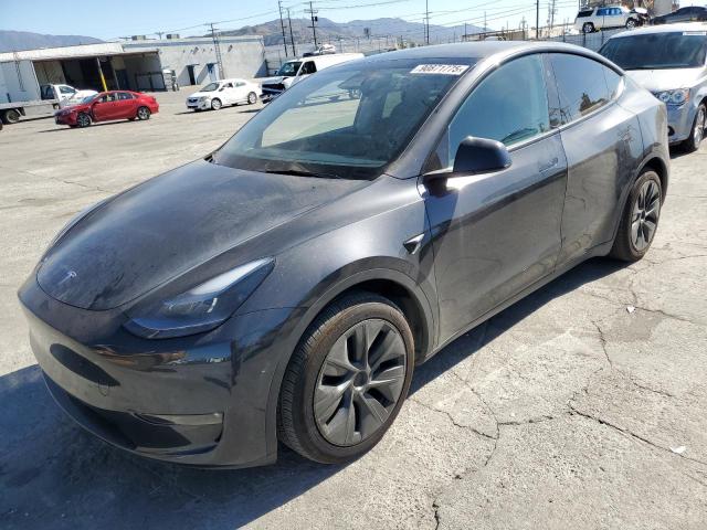 TESLA MODEL Y 2024 with VIN 7SAYGAEE8RF209495 - Photo from auction