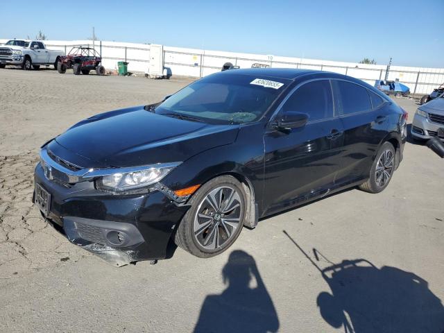 Photo 1 from auction – 2018 HONDA CIVIC EX with VIN JHMFC1F32JX032464