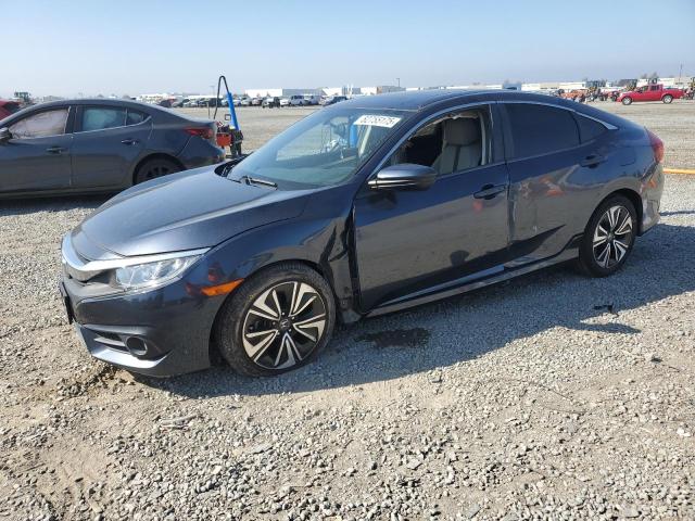 HONDA CIVIC EX 2018 with VIN JHMFC1F39JX015855 - Photo from auction