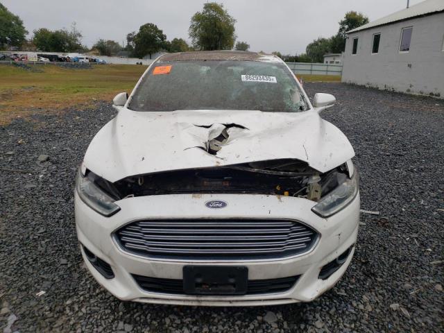 Photo 5 from auction – 2016 FORD FUSION TIT with VIN 3FA6P0K98GR138810