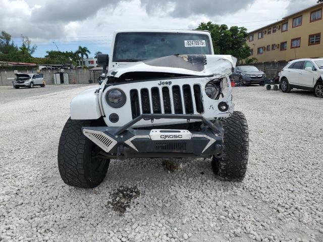 Photo 5 from auction – 2014 JEEP WRANGLER U with VIN 1C4BJWEG9EL326111