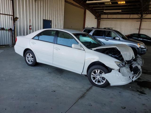 Photo 4 from auction – 2004 TOYOTA CAMRY LE with VIN 4T1BF30K04U077293