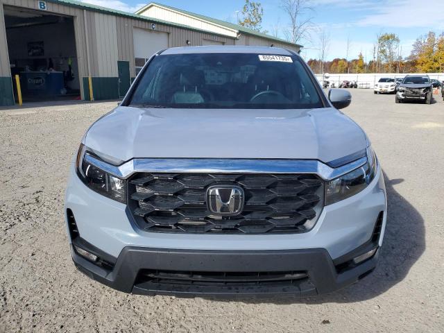 Photo 5 from auction – 2023 HONDA PASSPORT E with VIN 5FNYF8H54PB029948