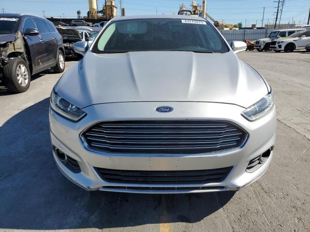 Photo 5 from auction – 2015 FORD FUSION SE PHEV with VIN 3FA6P0PU0FR128736