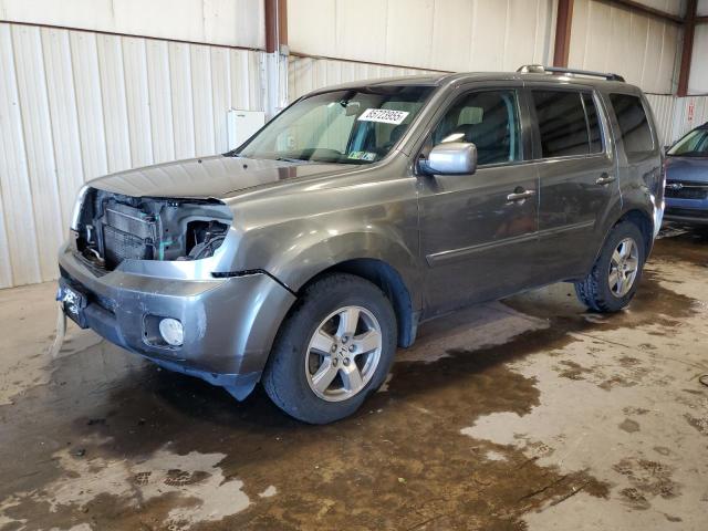 HONDA PILOT EX 2011 with VIN 5FNYF4H49BB068060 - Photo from auction