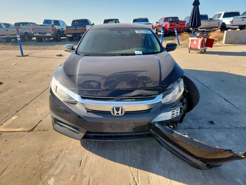 Photo 5 from auction – 2016 HONDA CIVIC with VIN 19XFC2F73GE097133