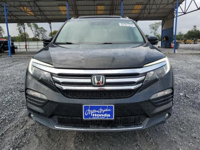 Photo 5 from auction – 2016 HONDA PILOT TOUR with VIN 5FNYF5H92GB046958