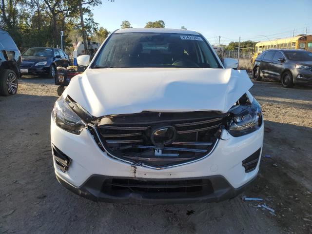 Photo 5 from auction – 2016 MAZDA CX-5 GT with VIN JM3KE4DYXG0630191