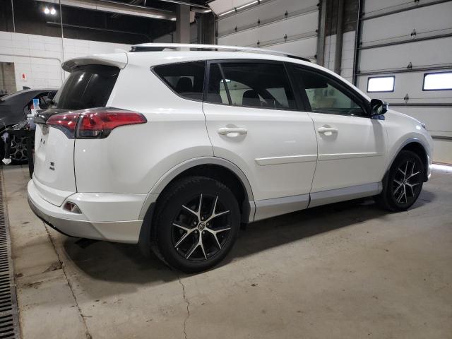 Photo 3 from auction – 2016 TOYOTA RAV4 SE with VIN JTMJFREV7GD176977