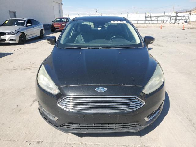 Photo 5 from auction – 2015 FORD FOCUS with VIN 1FADP3J24FL281084
