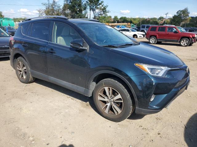 Photo 4 from auction – 2017 TOYOTA RAV4 XLE with VIN JTMWFREV8HD098250