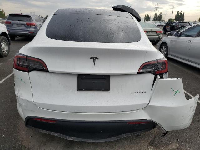 Photo 6 from auction – 2023 TESLA MODEL Y with VIN 7SAYGDEE3PF607180