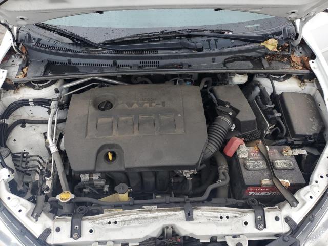 Photo 11 from auction – 2014 TOYOTA COROLLA L with VIN 5YFBURHEXEP019377