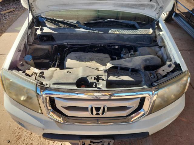 Photo 12 from auction – 2011 HONDA PILOT TOUR with VIN 5FNYF4H9XBB074039